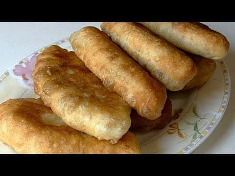 Жареные пирожки с рисом, яйцом и луком